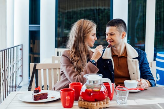 restaurant. a guy with a girl drink hot coffee and tea 1