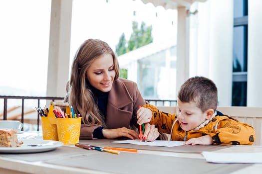 mom with boy draw colored pencils 1