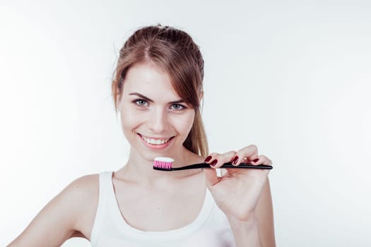 girl with a toothbrush white teeth dentistry