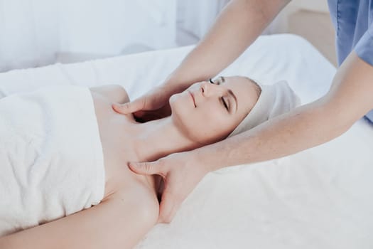 beautiful girl make massage therapy neck in Spa 1