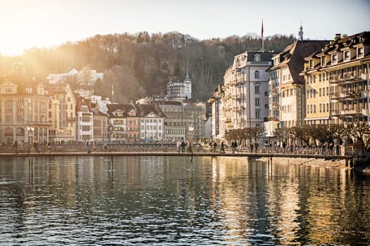 A body of water surrounded by tall buildings in Switzerland