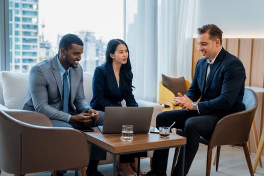 Group of diverse executive investor listening businessman talking about investment. Professional business team discussing about business plan, statistic, marketing strategy at office. Ornamented.