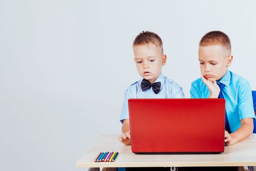 study on the computer two boys at school 1