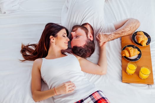 man and woman breakfast in bed nice