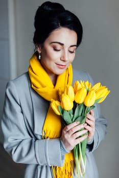 the girl gave the spring yellow tulips 1