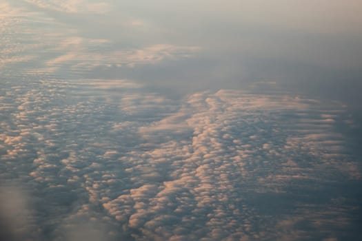 clouds at sunset from the plane in the sky landscape 1