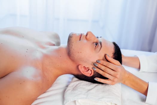 male masseur doing massage health spa procedure 1