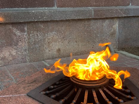 eternal fire burns on gas memorial