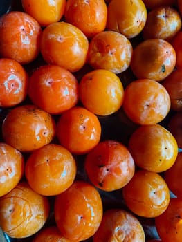 fruit ripe persimmon as a background