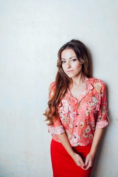 girl in pink business suit posing smiling 1