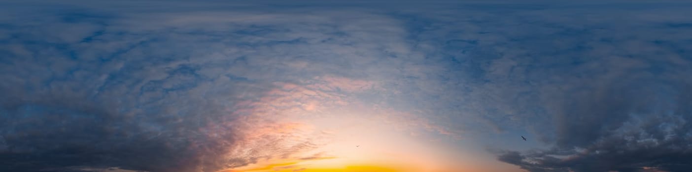 Bright sunset sky panorama with Cirrus clouds. Seamless hdr spherical equirectangular 360 panorama. Sky dome or zenith for 3D visualization, game and sky replacement for aerial drone 360 panoramas.