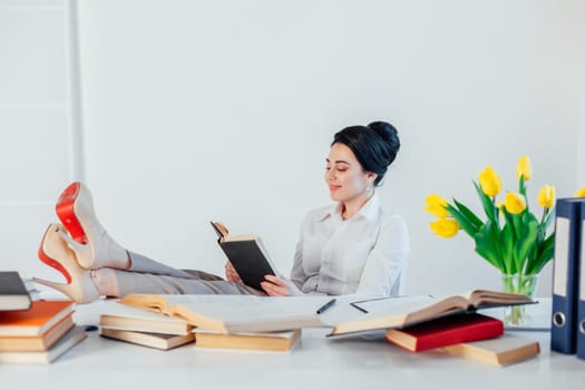 business girl sits in the Office paper folders Secretary 1