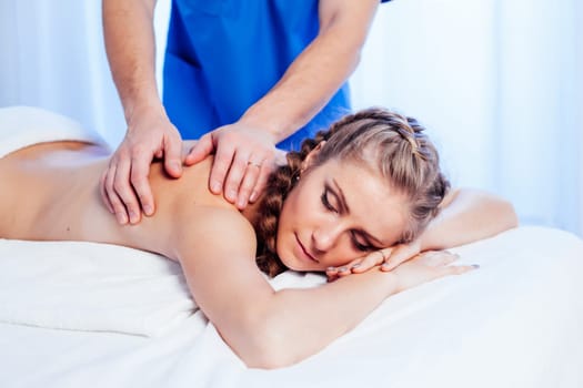girl masseur doing massage back spa health 1