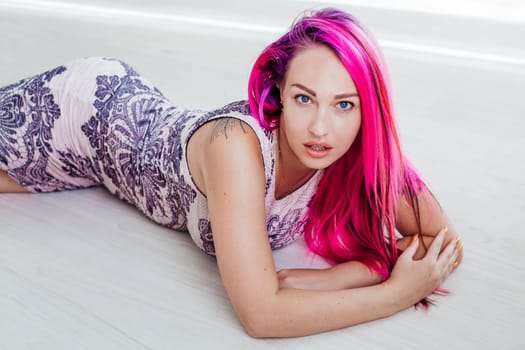 beautiful girl with pink hair posing at photoshoot 1