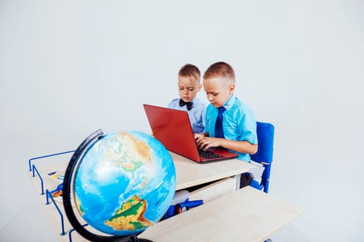 the two boys are engaged for computer lessons in the school