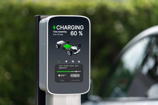 Electric vehicle technology utilized to residential area or home charging station for EV car battery recharge. Eco-friendly transport by clean and sustainable energy for future environment. Synchronos