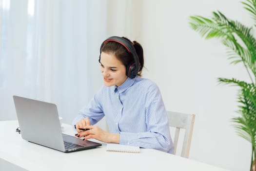 Woman running negotiations on laptop financial from office