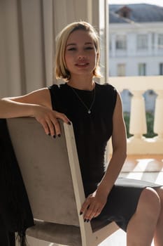 Beautiful woman sitting on an office chair