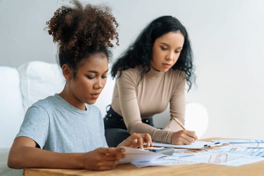 Stressed African American women has financial problems with credit card debt to pay crucial show concept of bad personal money and mortgage pay management crisis.