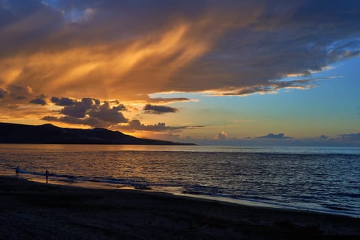 Sunset view at Playa de Las Canteras beach at Las Palmas de Gran Canaria