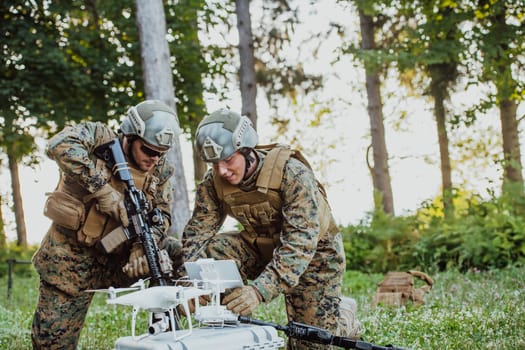 Modern Warfare Soldiers Squad are Using Drone for Scouting and Surveillance During Military Operation in the Forest.