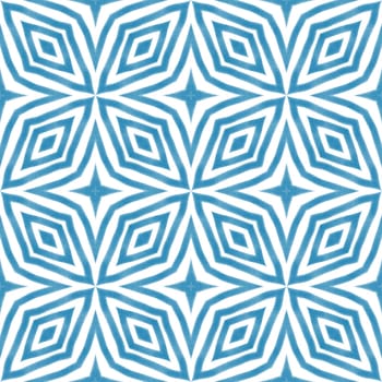 Chevron stripes design. Blue symmetrical kaleidoscope background. Geometric chevron stripes pattern. Textile ready appealing print, swimwear fabric, wallpaper, wrapping.
