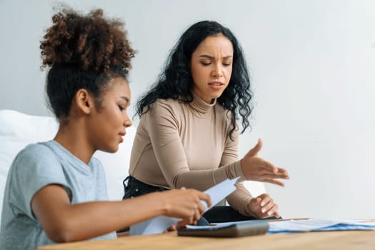 Stressed African American women has financial problems with credit card debt to pay crucial show concept of bad personal money and mortgage pay management crisis.