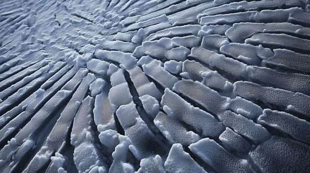 Tire marks on sand close up image textured tire tracks on sand close up industrial background. Tire tracks prints on ground. The texture of the earth with traces of the tire treads of the tires