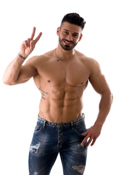 A shirtless man posing for the camera doing V for Victory sign with fingers