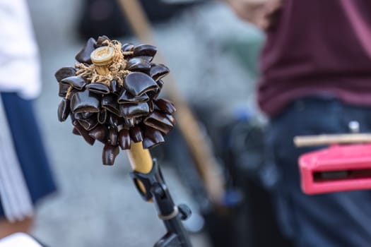 A close-up view of intricately designed tribal maracas, highlighting cultural artistry.