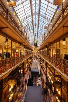 SYDNEY, AUSTRALIA DECEMBER 3 2023 - The Strand Arcade with Christmas lights and decorations in the middle of a busy day in Sydney CBD, New South Wales, Australia