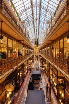 SYDNEY, AUSTRALIA DECEMBER 3 2023 - The Strand Arcade with Christmas lights and decorations in the middle of a busy day in Sydney CBD, New South Wales, Australia