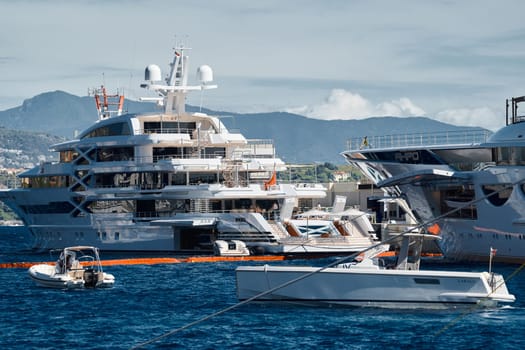 Monaco, Monte Carlo, 27 September 2022 - a lot of luxury yachts at the famous motorboat exhibition in the principality, the most expensive boats for the richest people around the world, yacht brokers. High quality photo