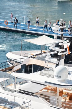 Monaco, Monte Carlo, 27 September 2022 - a lot of luxury yachts at the famous motorboat exhibition in the principality, the most expensive boats for the richest people around the world, yacht brokers. High quality photo