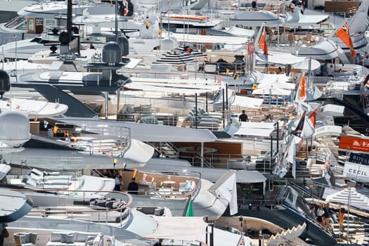 Monaco, Monte Carlo, 27 September 2022 - a lot of luxury yachts at the famous motorboat exhibition in the principality, the most expensive boats for the richest people around the world, yacht brokers. High quality photo