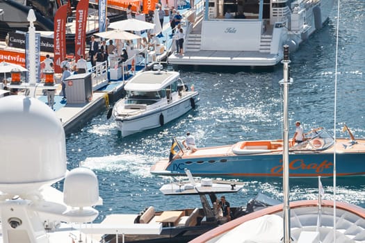 Monaco, Monte Carlo, 27 September 2022 - a lot of luxury yachts at the famous motorboat exhibition in the principality, the most expensive boats for the richest people around the world, yacht brokers. High quality photo