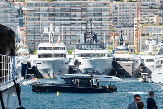 Monaco, Monte Carlo, 27 September 2022 - a lot of luxury yachts at the famous motorboat exhibition in the principality, the most expensive boats for the richest people around the world, yacht brokers. High quality photo