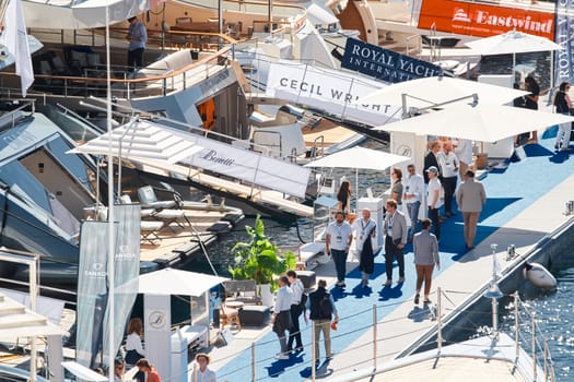 Monaco, Monte Carlo, 27 September 2022 - a lot of luxury yachts at the famous motorboat exhibition in the principality, the most expensive boats for the richest people around the world, yacht brokers. High quality photo