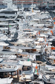 Monaco, Monte Carlo, 27 September 2022 - a lot of luxury yachts at the famous motorboat exhibition in the principality, the most expensive boats for the richest people around the world, yacht brokers. High quality photo