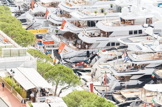 Monaco, Monte Carlo, 27 September 2022 - a lot of luxury yachts at the famous motorboat exhibition in the principality, the most expensive boats for the richest people around the world, yacht brokers. High quality photo