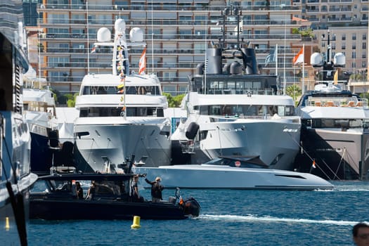 Monaco, Monte Carlo, 27 September 2022 - a lot of luxury yachts at the famous motorboat exhibition in the principality, the most expensive boats for the richest people around the world, yacht brokers. High quality photo