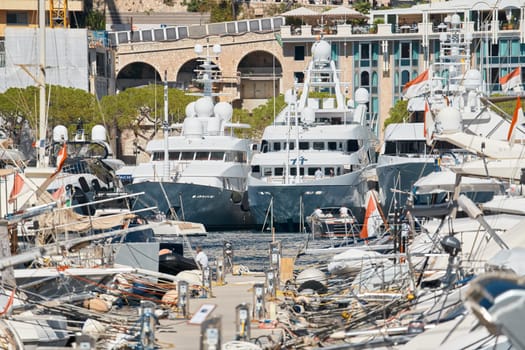 Monaco, Monte Carlo, 27 September 2022 - a lot of luxury yachts at the famous motorboat exhibition in the principality, the most expensive boats for the richest people around the world, yacht brokers. High quality photo