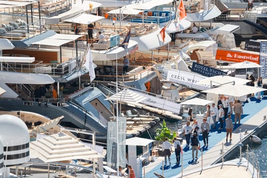 Monaco, Monte Carlo, 27 September 2022 - a lot of luxury yachts at the famous motorboat exhibition in the principality, the most expensive boats for the richest people around the world, yacht brokers. High quality photo