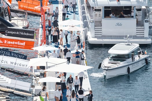 Monaco, Monte Carlo, 27 September 2022 - a lot of luxury yachts at the famous motorboat exhibition in the principality, the most expensive boats for the richest people around the world, yacht brokers. High quality photo