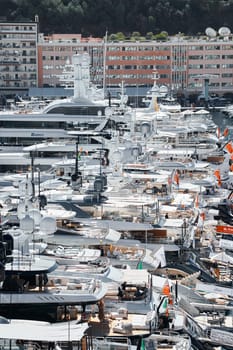 Monaco, Monte Carlo, 27 September 2022 - a lot of luxury yachts at the famous motorboat exhibition in the principality, the most expensive boats for the richest people around the world, yacht brokers. High quality photo