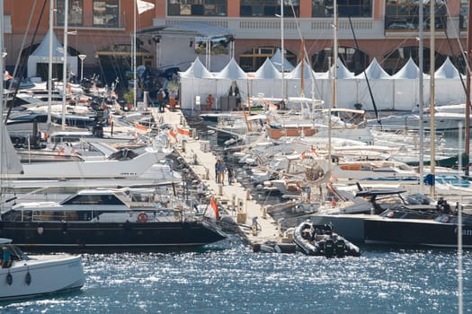 Monaco, Monte Carlo, 27 September 2022 - a lot of luxury yachts at the famous motorboat exhibition in the principality, the most expensive boats for the richest people around the world, yacht brokers. High quality photo