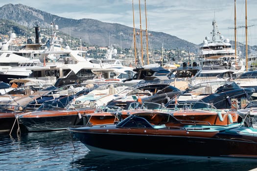 Monaco, Monte Carlo, 27 September 2022 - a lot of luxury yachts at the famous motorboat exhibition in the principality, the most expensive boats for the richest people around the world, yacht brokers. High quality photo