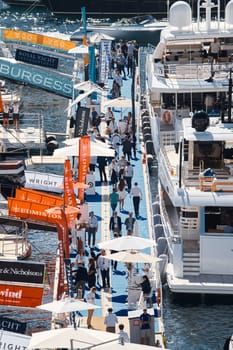 Monaco, Monte Carlo, 27 September 2022 - a lot of luxury yachts at the famous motorboat exhibition in the principality, the most expensive boats for the richest people around the world, yacht brokers. High quality photo