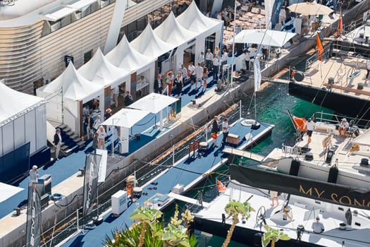 Monaco, Monte Carlo, 27 September 2022 - a lot of luxury yachts at the famous motorboat exhibition in the principality, the most expensive boats for the richest people around the world, yacht brokers. High quality photo