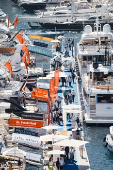 Monaco, Monte Carlo, 27 September 2022 - a lot of luxury yachts at the famous motorboat exhibition in the principality, the most expensive boats for the richest people around the world, yacht brokers. High quality photo